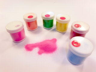 ARENA DE COLORES